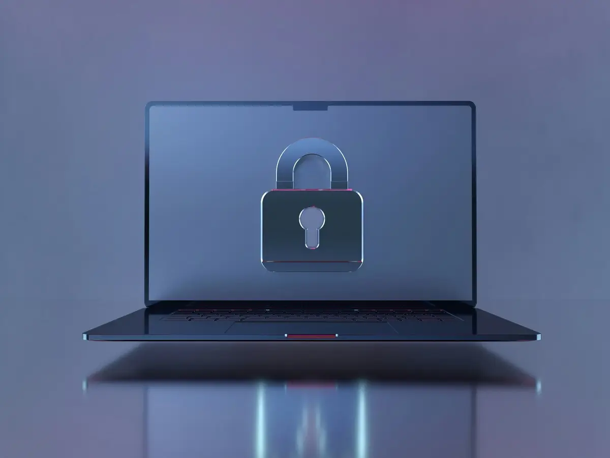 Ordinateur portable affichant un cadenas symbolisant les cyberattaques causées par des problèmes organisationnels et de gouvernance TI